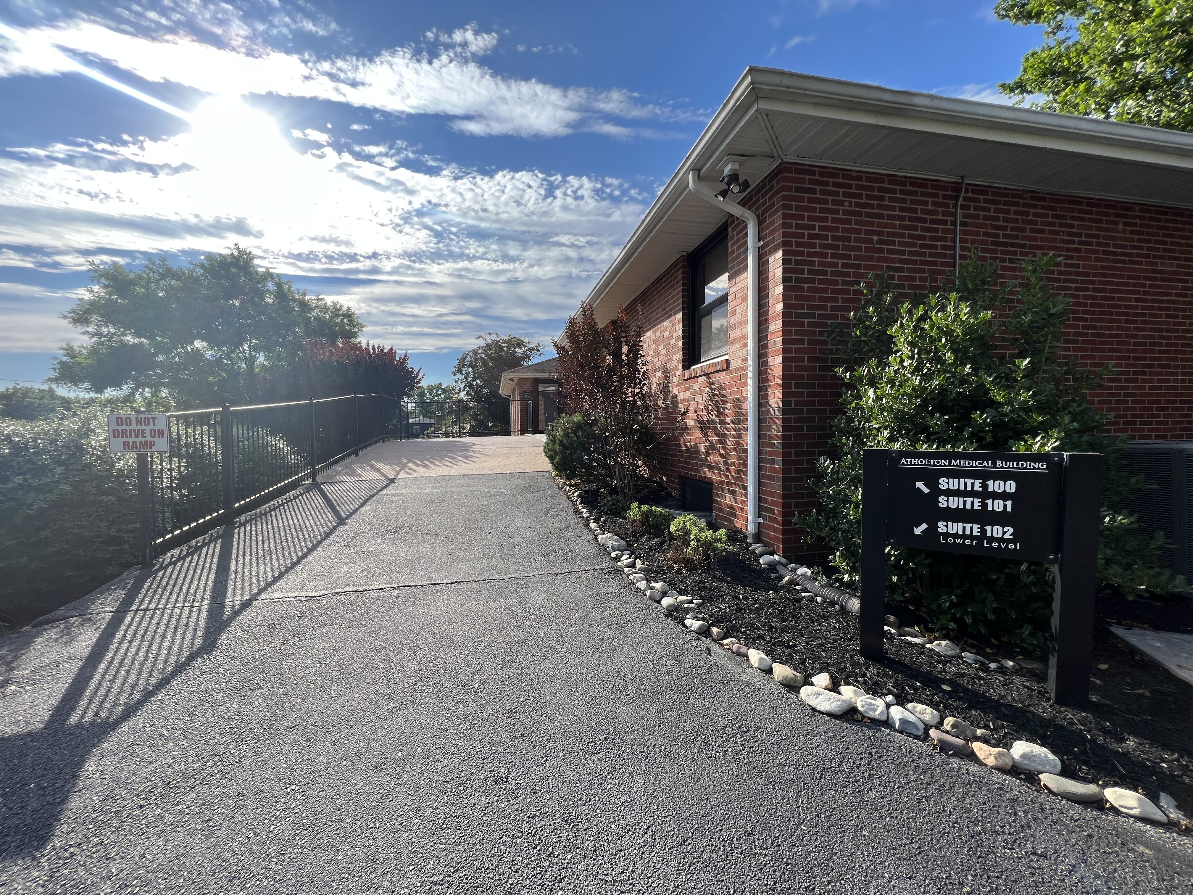 Peaceful outdoor walking path to Tanager Family Dentistry Office in Columbia, MD, Suite 101